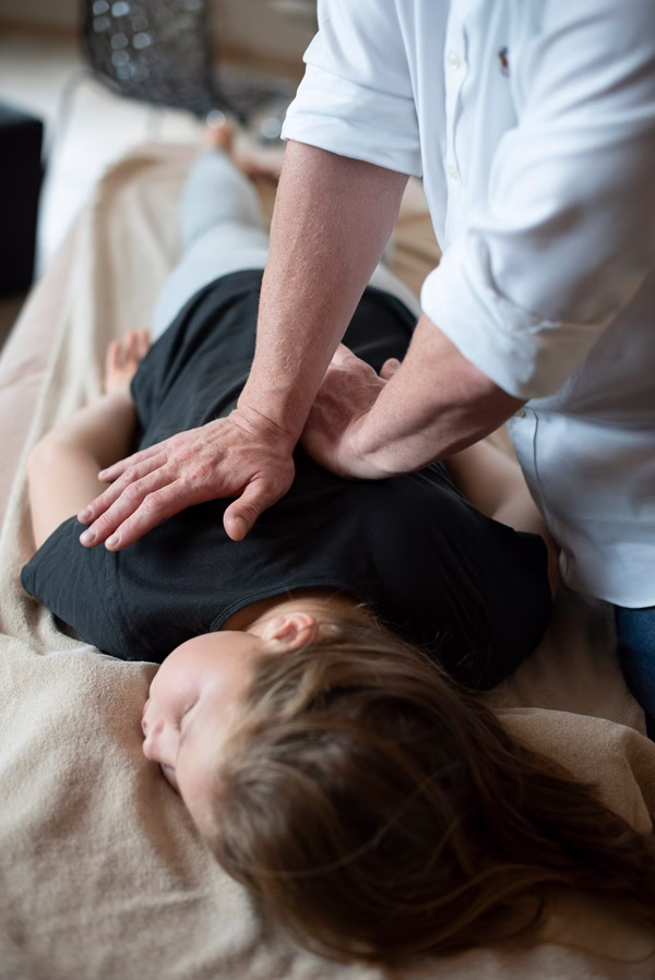 Happy patient after chiropractic care at a "chiropractor near me".