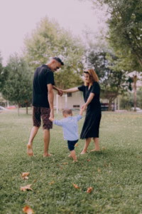 Parents playing pain free with their son.